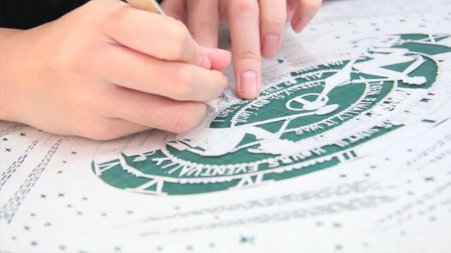 Rob Ryan - paper cutting the Heathrow Christmas card Rob Ryan - paper cutting the Heathrow Christmas card