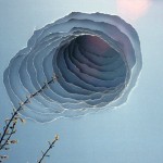 Clouds, Smoke and Portals from Torn Photographs