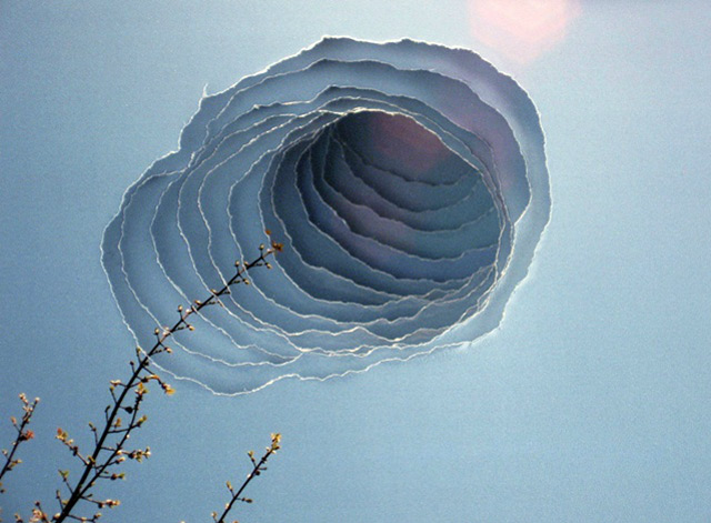Clouds, Smoke and Portals from Torn Photographs