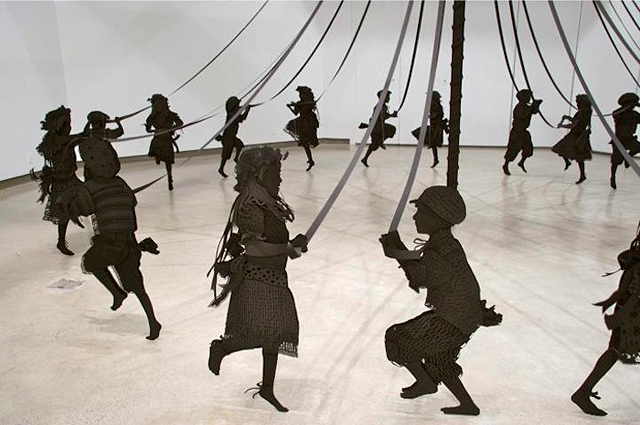 Paper Sculpture of Children Happily Dancing