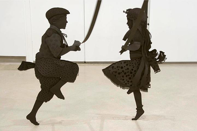 Paper Sculpture of Children Happily Dancing
