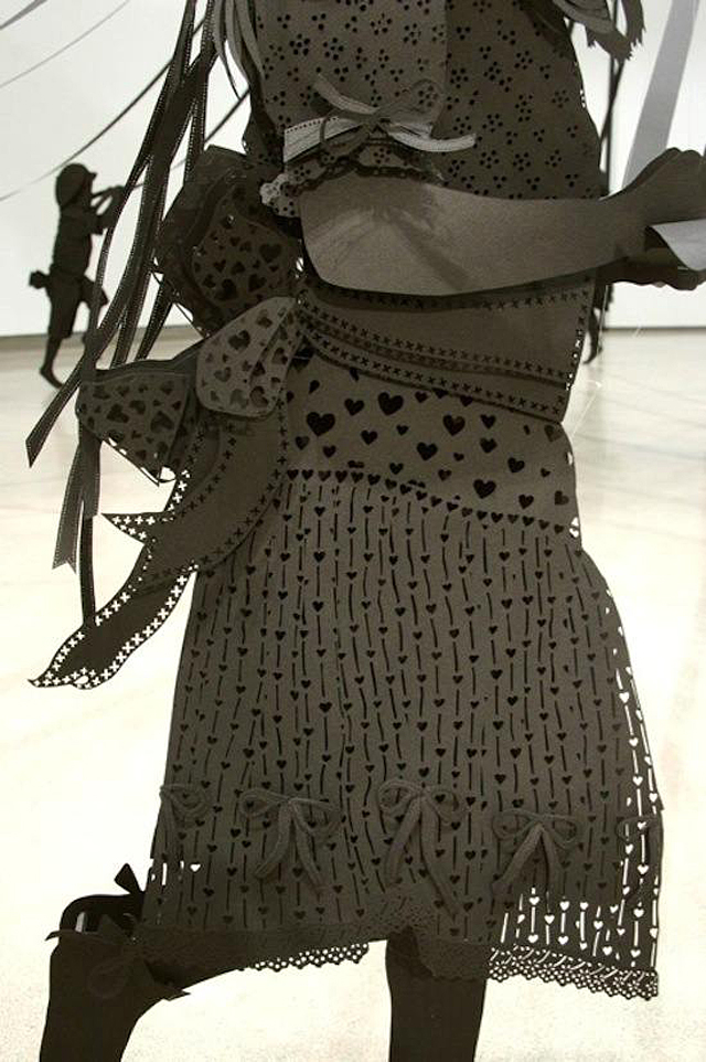 Paper Sculpture of Children Happily Dancing
