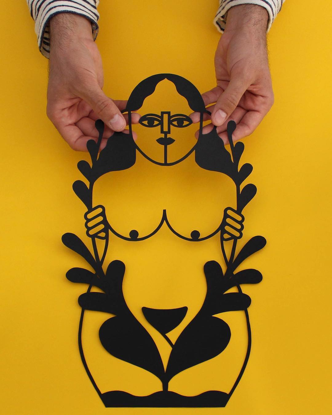 cubist-inspired paper cutouts are effortlessly cut from a single